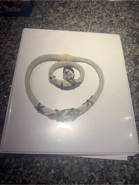 UNO de 50 Ivory Necklace, Bracelet, and ring Set with Black Floral Accents